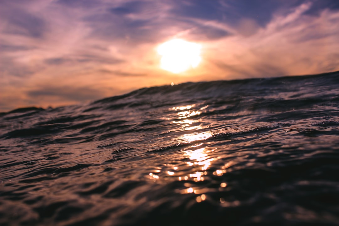 body-of-water-with-sun-0WrZceP8V28.jpg